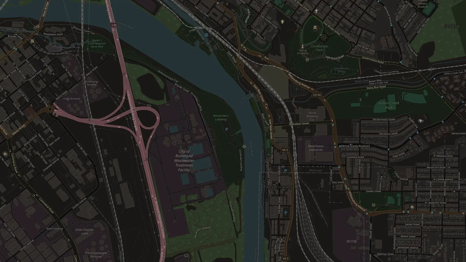 Map of Ancarrow's Landing on the tidal James River showing the boat ramp, parking area, and four fishing zones: the deep main-channel holes, the riprap bank by the ramp, the Manchester Docks pilings, and the outside-bend dropoff.
