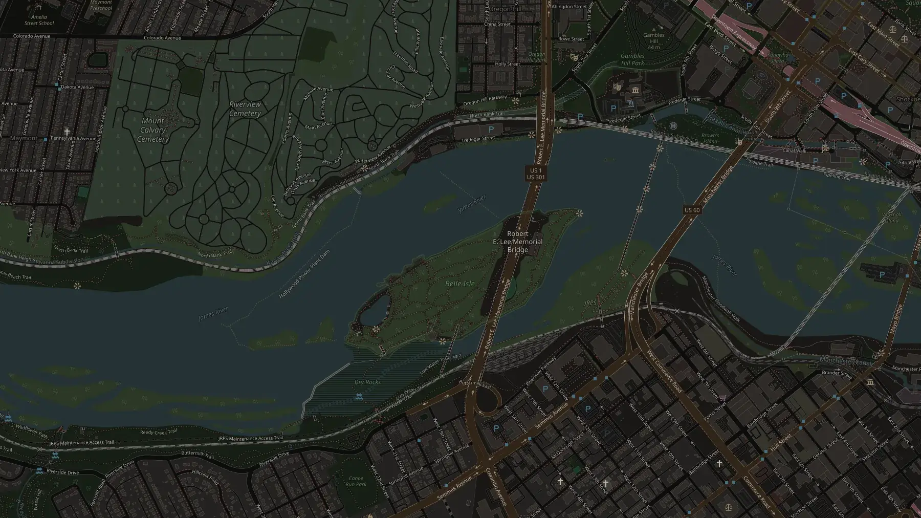 Map of Belle Isle in the James River showing the footbridge from the north bank and four fishing zones: the North Rocks on the main current, the East End eddy, the West End upstream point, and the shallower South Channel.
