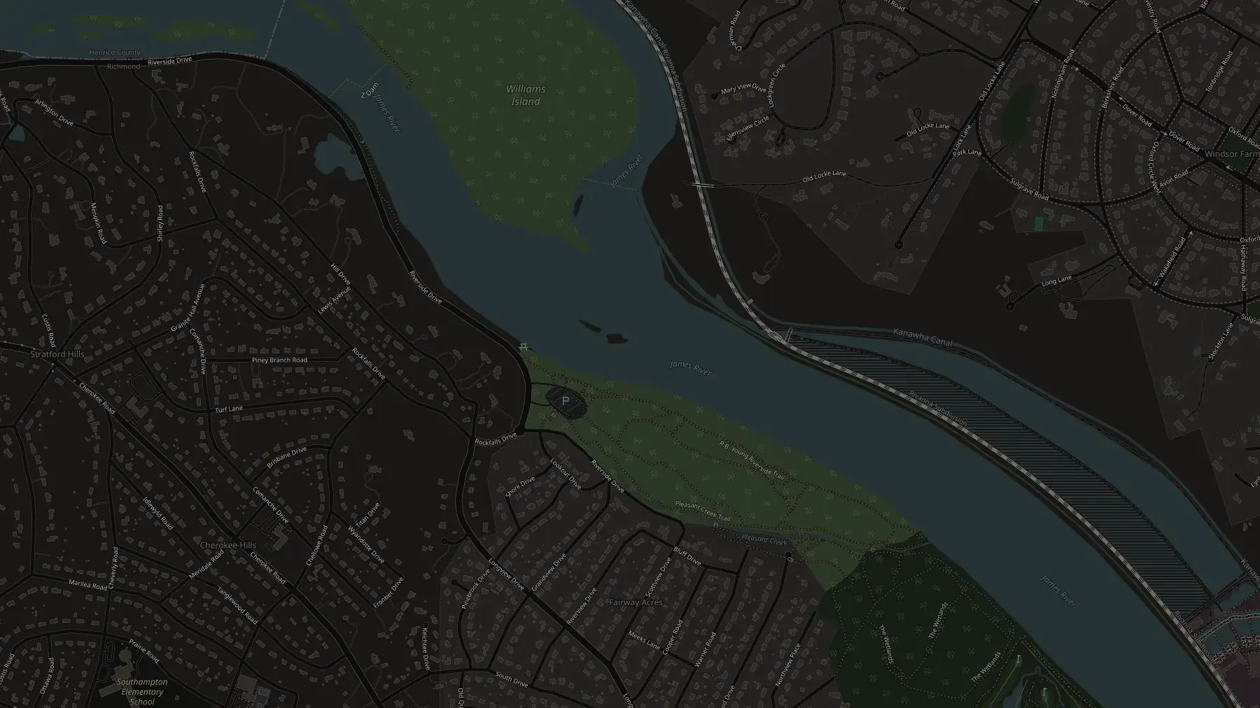 Map of Pony Pasture Rapids on the James River showing the Riverside Drive parking area, the path to the gravel beach, and four fishing zones: the mid-river boulders, the current seams along the beach, the downstream rock fields, and the deeper pools.